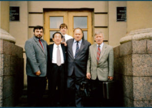 2005_from right to left: Professor Władimir Łoginowski, Professor Bogumił Łączyński, Hishashi Yamamoto, Prof Adam Weintrit in front on the entrance of the State Maritime School in Leningrad